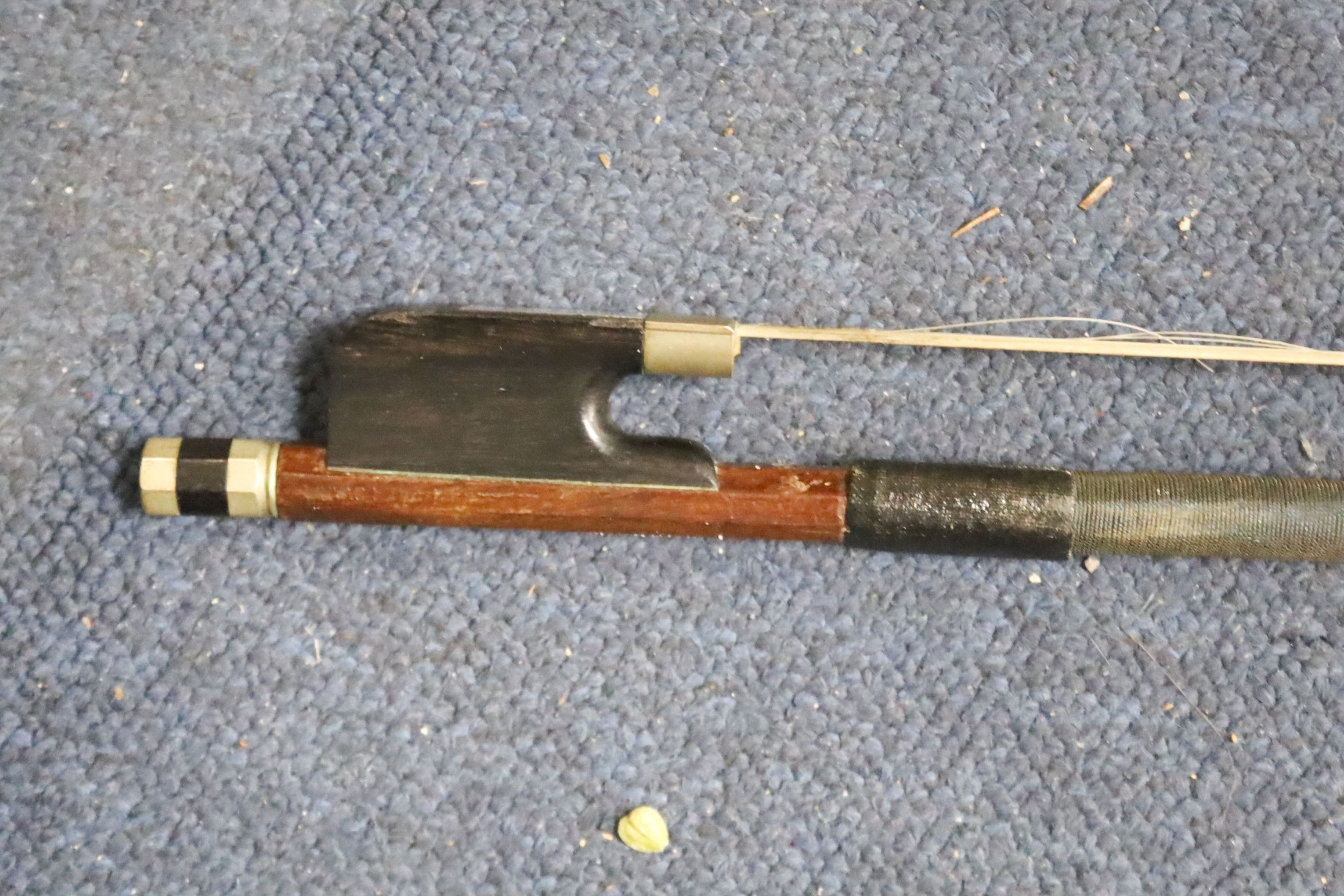 Early 20th century German cello and bow, the back measuring 75cm excluding the button